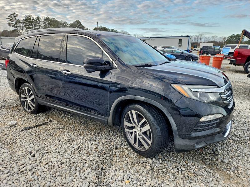 Photo 4 from auction – 2016 HONDA PILOT TOUR with VIN 5FNYF5H92GB050783
