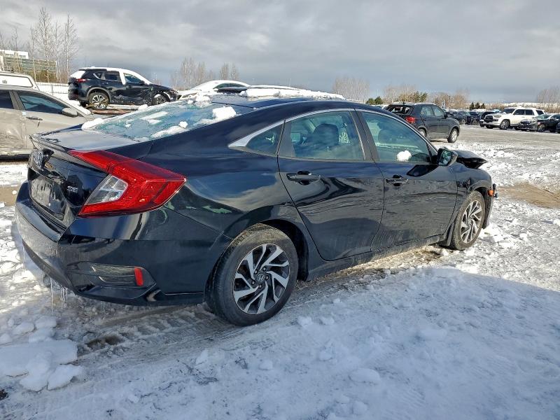 Photo 3 from auction – 2018 HONDA CIVIC LX with VIN 2HGFC2F60JH021101