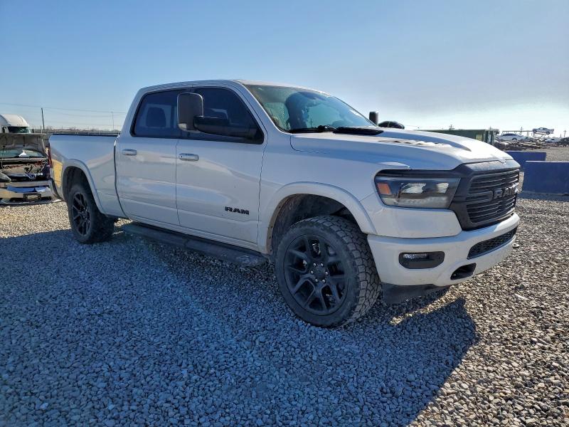 Photo 4 from auction – 2021 RAM 1500 with VIN 1C6SRFRT6MN799135