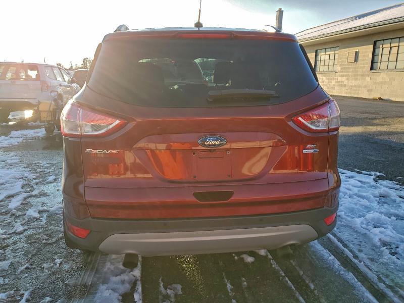 Photo 6 from auction – 2016 FORD ESCAPE SE with VIN 1FMCU9GX9GUB73734
