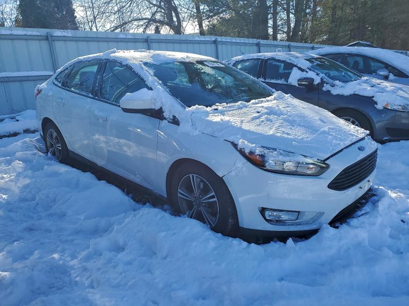 Photo 4 from auction – 2018 FORD FOCUS SE with VIN 1FADP3FEXJL232077