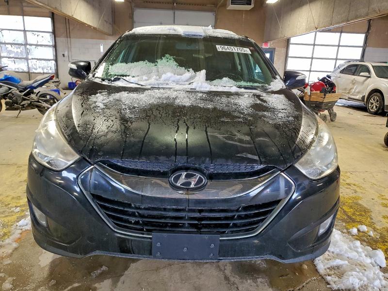 Photo 5 from auction – 2012 HYUNDAI TUCSON GLS with VIN KM8JUCAC4CU404382