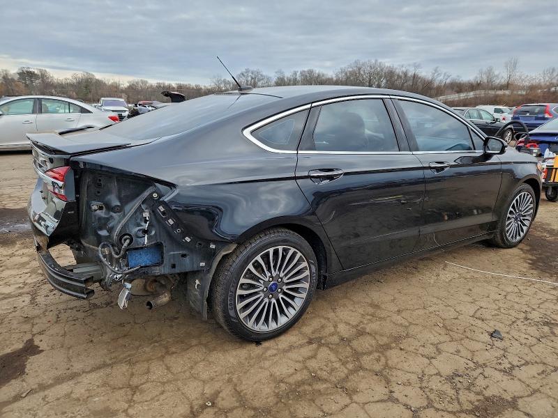 Photo 3 from auction – 2017 FORD FUSION TIT with VIN 3FA6P0D94HR331633