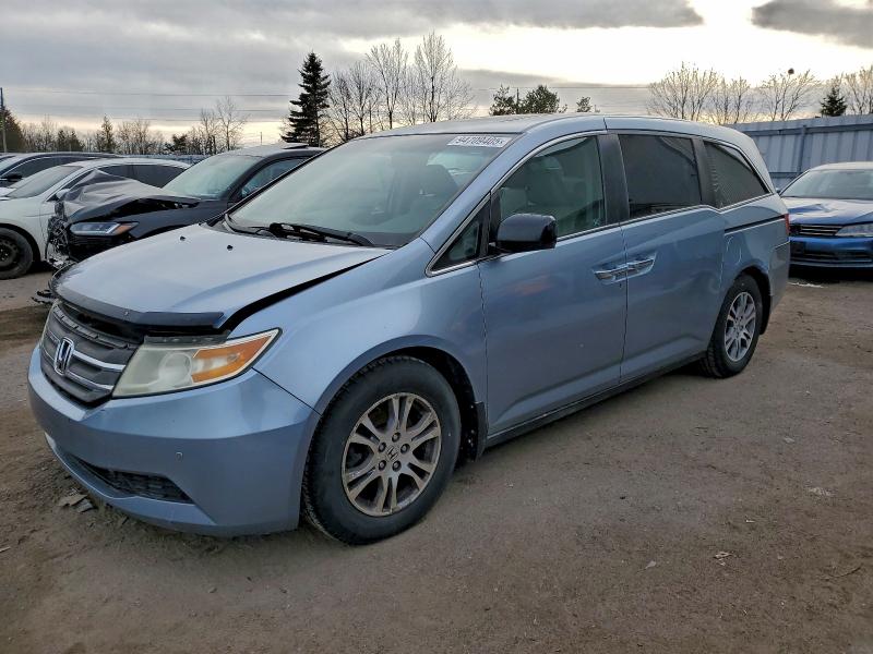 HONDA ODYSSEY EX 2011 with VIN 5FNRL5H67BB501444 - Photo from auction