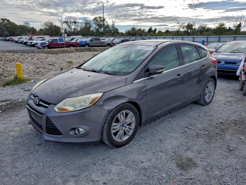 FORD FOCUS SEL 2012 with VIN 1FAHP3M20CL320455 - Photo from auction