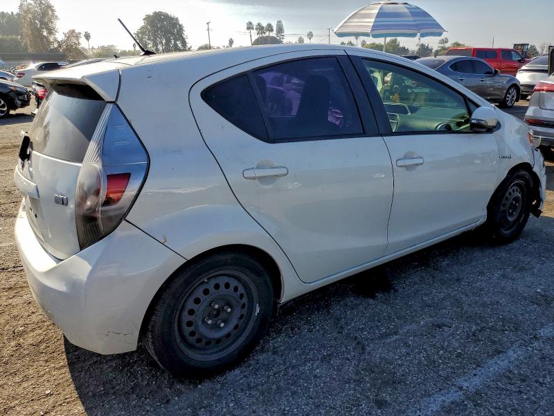 Photo 3 from auction – 2014 TOYOTA PRIUS C with VIN JTDKDTB39E1060415