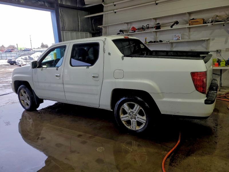 Photo 2 from auction – 2011 HONDA RIDGELINE with VIN 5FPYK1F58BB003455