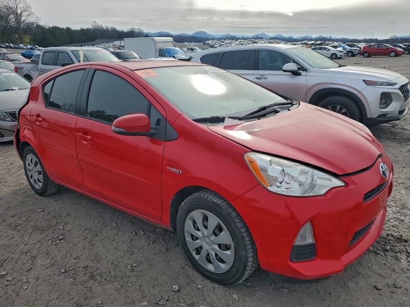 Photo 4 from auction – 2014 TOYOTA PRIUS C with VIN JTDKDTB33E1562322