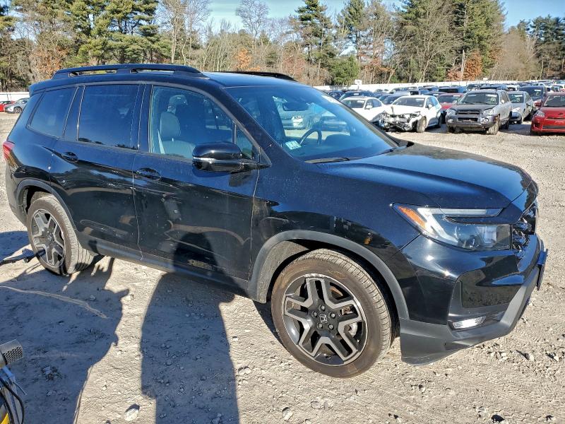 Photo 4 from auction – 2022 HONDA PASSPORT E with VIN 5FNYF8H0XNB014873