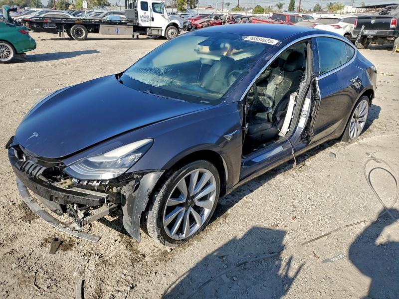 TESLA MODEL 3 2018 with VIN 5YJ3E1EB9JF090928 - Photo from auction