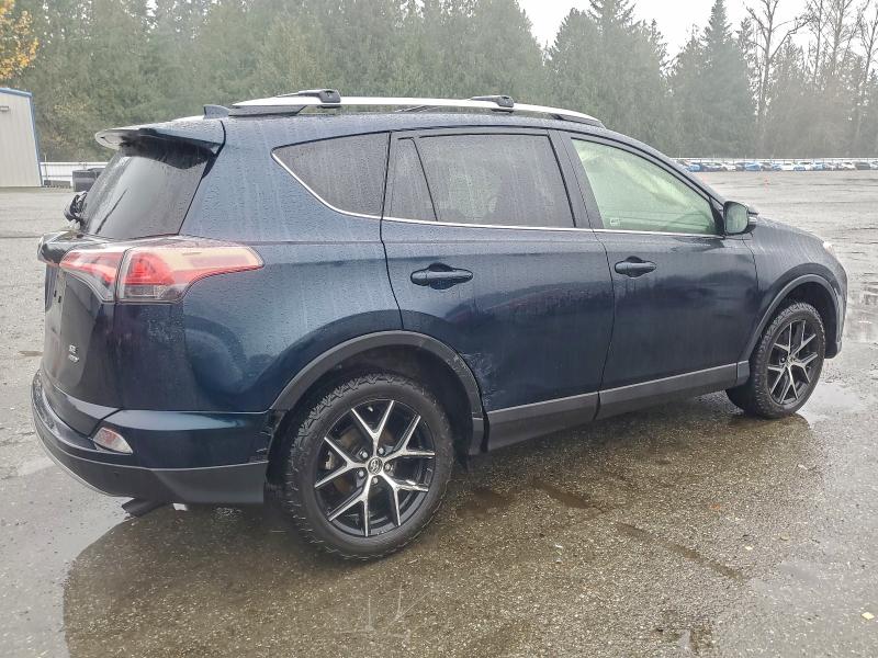 Photo 3 from auction – 2017 TOYOTA RAV4 SE with VIN JTMJFREV0HD219637
