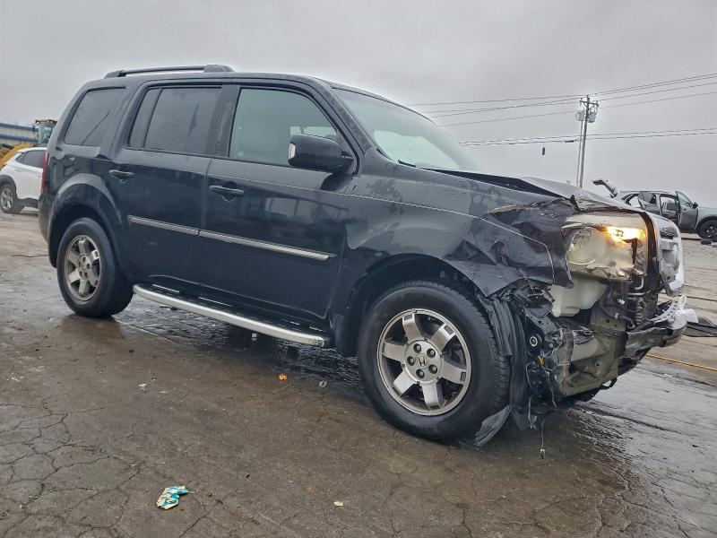 Фото 4 с аукциона – 2011 HONDA PILOT TOUR с VIN 5FNYF3H91BB010160
