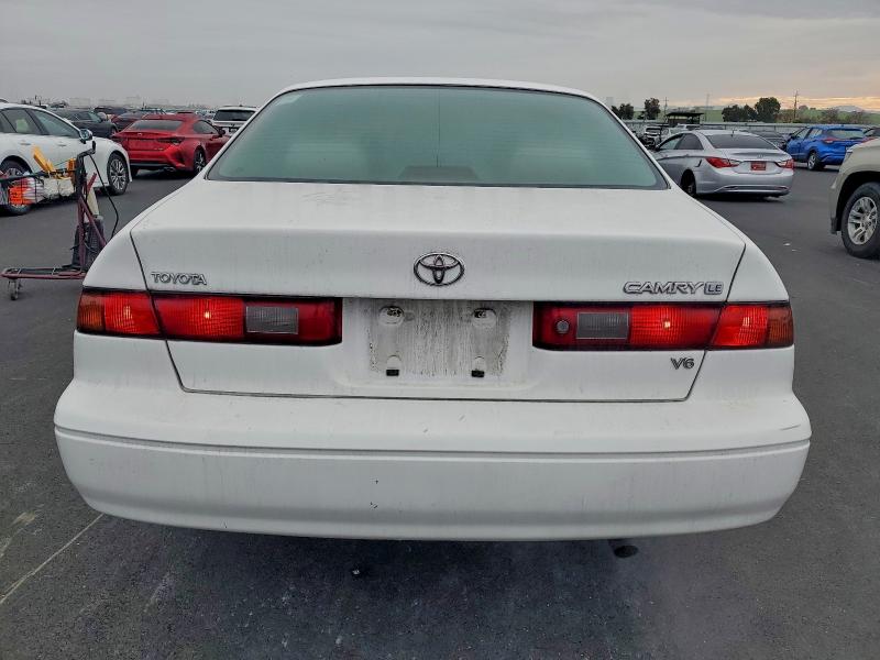 Photo 6 from auction – 1999 TOYOTA CAMRY LE with VIN JT2BF22K3X0176643