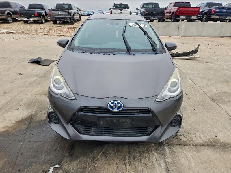 Photo 5 from auction – 2015 TOYOTA PRIUS C with VIN JTDKDTB3XF1114709