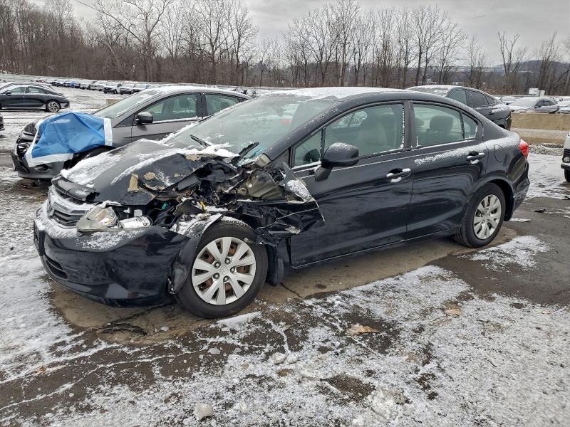 HONDA CIVIC LX 2012 with VIN 19XFB2E57CE064763 - Photo from auction