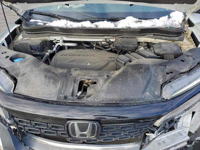 Photo 12 from auction – 2021 HONDA PASSPORT E with VIN 5FNYF8H04MB020389