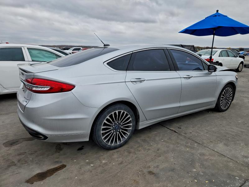 Photo 3 from auction – 2018 FORD FUSION TIT with VIN 3FA6P0D91JR128415