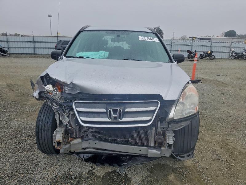 Photo 5 from auction – 2005 HONDA CR-V LX with VIN JHLRD68595C007469
