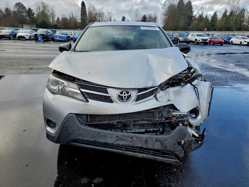Photo 5 from auction – 2015 TOYOTA RAV4 LE with VIN JTMZFREV9FD055188