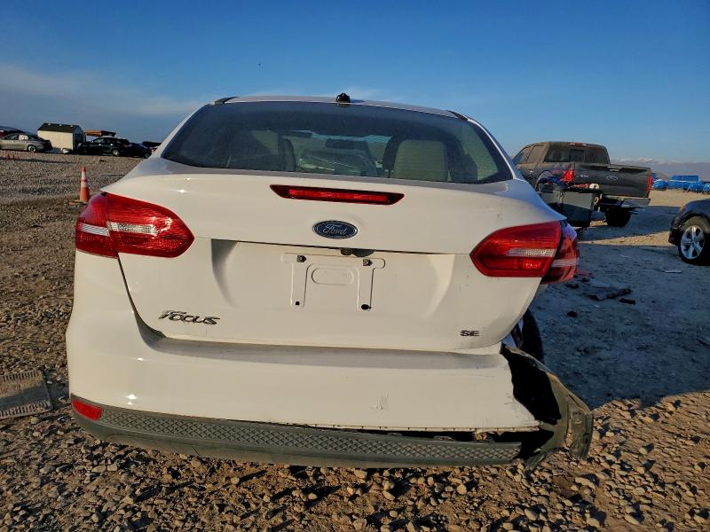 Photo 6 from auction – 2018 FORD FOCUS SE with VIN 1FADP3F25JL304356