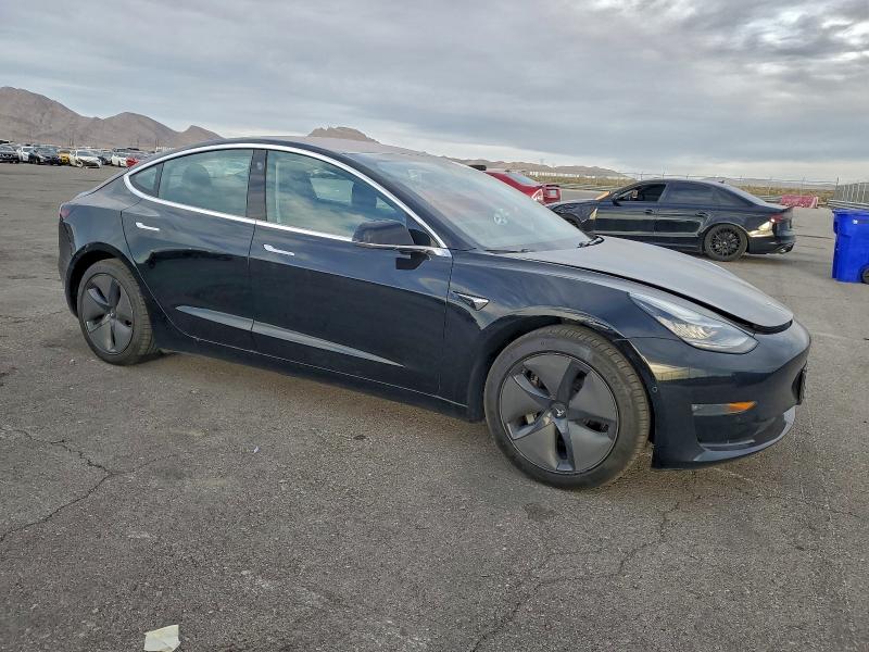 Photo 4 from auction – 2018 TESLA MODEL 3 with VIN 5YJ3E1EA9JF057838