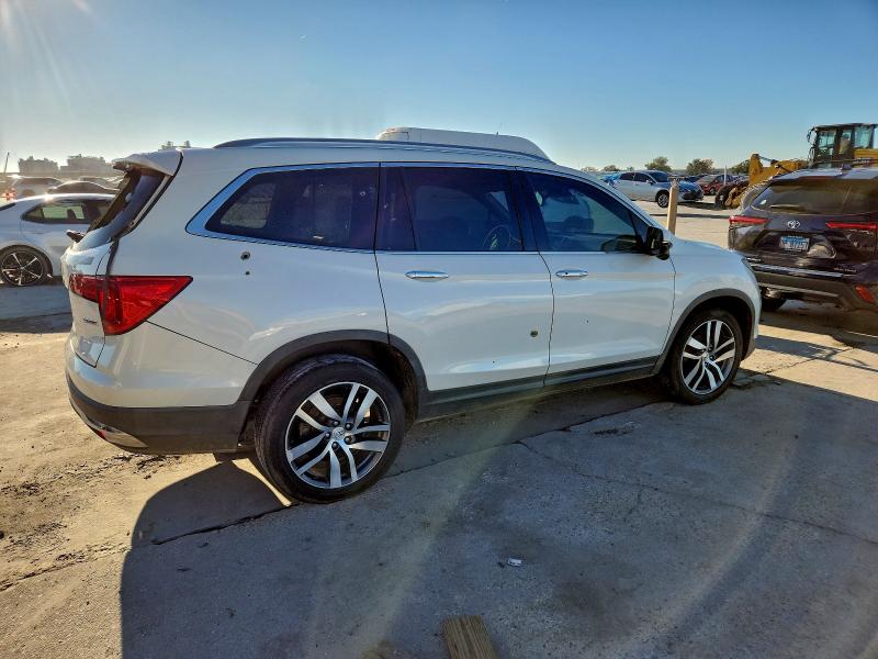 Photo 3 from auction – 2016 HONDA PILOT TOUR with VIN 5FNYF5H90GB039166