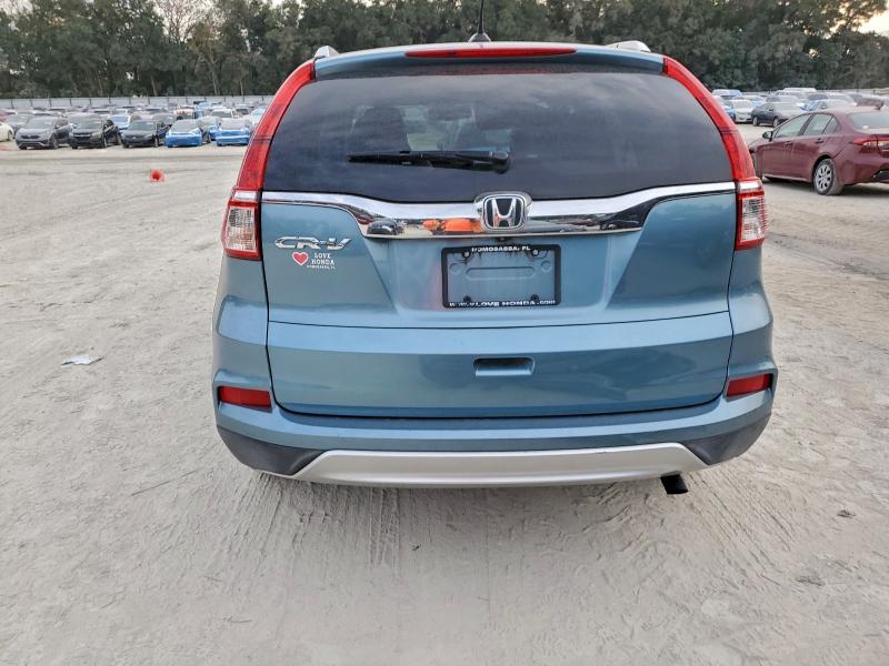 Photo 6 from auction – 2016 HONDA CR-V EXL with VIN 2HKRM3H79GH556416
