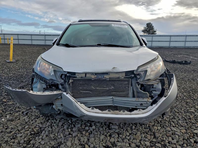 Photo 5 from auction – 2012 HONDA CR-V EXL with VIN JHLRM4H74CC007673