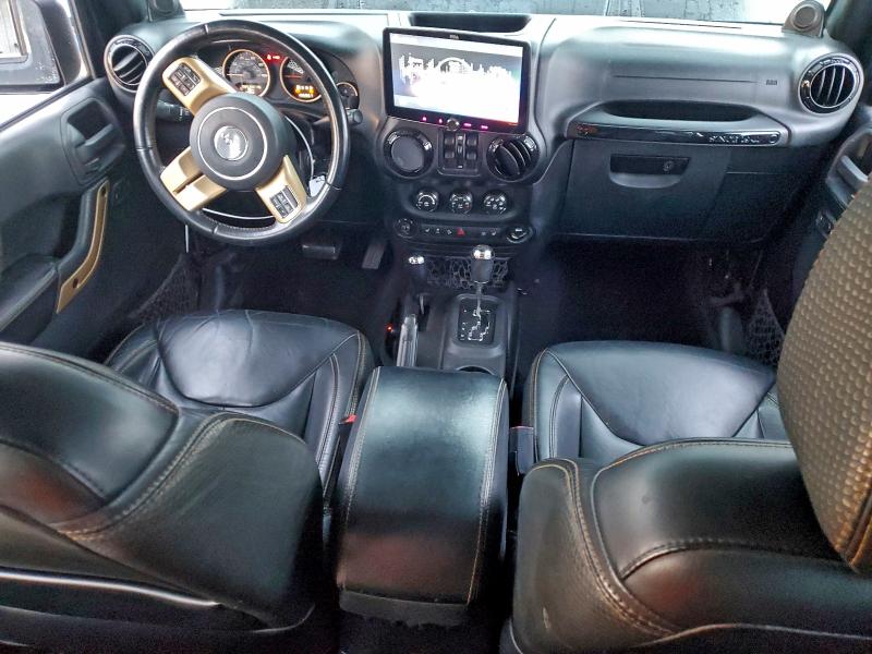 Photo 8 from auction – 2014 JEEP WRANGLER U with VIN 1C4BJWEG4EL180149