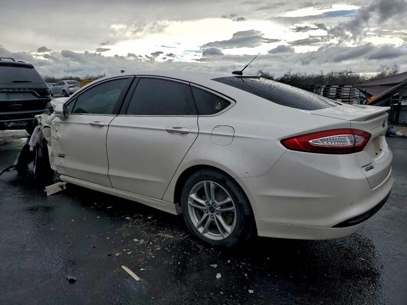 Photo 2 from auction – 2016 FORD FUSION TIT with VIN 3FA6P0SU2GR144848