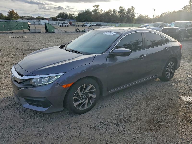 HONDA CIVIC EX 2017 с VIN 19XFC2F74HE226689 - Фото с аукциона