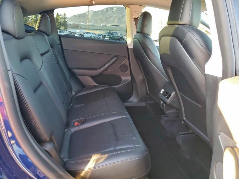 Photo 11 from auction – 2022 TESLA MODEL Y with VIN 7SAYGDEE4NF556169