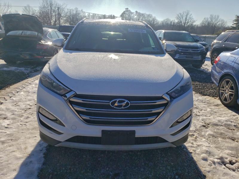 Photo 5 from auction – 2017 HYUNDAI TUCSON LIM with VIN KM8J3CA22HU325424