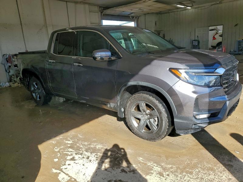 Photo 4 from auction – 2023 HONDA RIDGELINE with VIN 5FPYK3F77PB063831