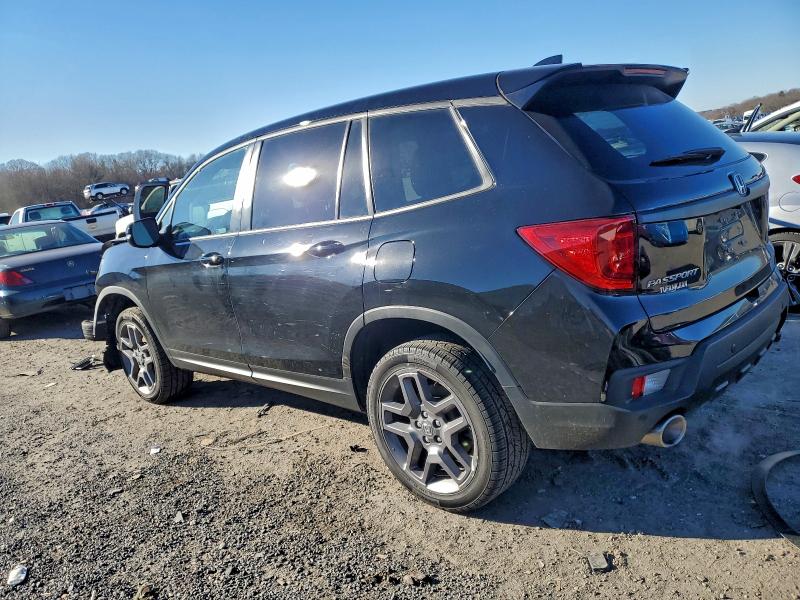 Photo 2 from auction – 2023 HONDA PASSPORT E with VIN 5FNYF8H52PB037885