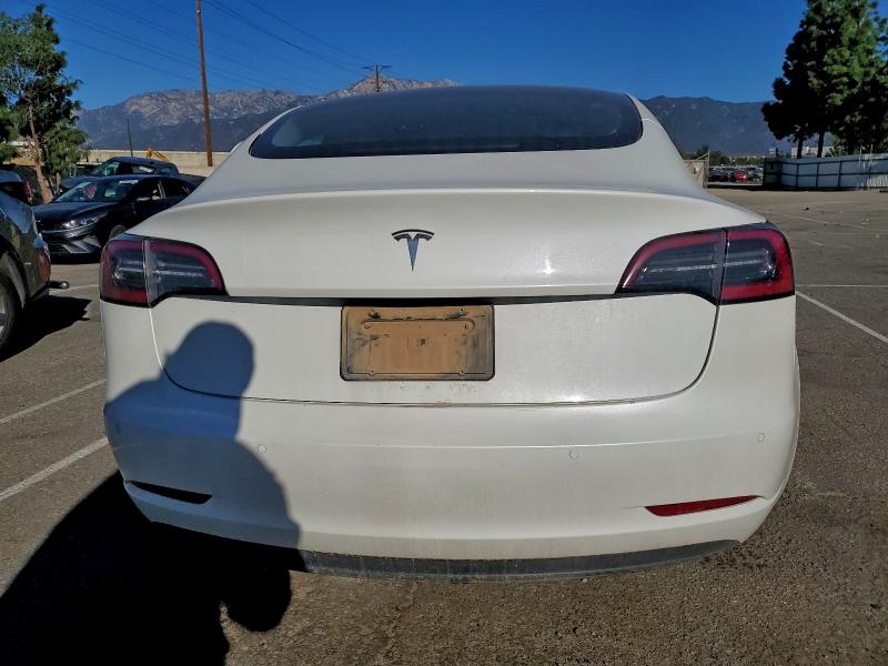 Photo 6 from auction – 2021 TESLA MODEL 3 with VIN 5YJ3E1EAXMF027039