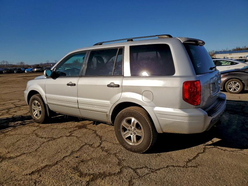 Photo 2 from auction – 2003 HONDA PILOT with VIN 2HKYF18573H529850