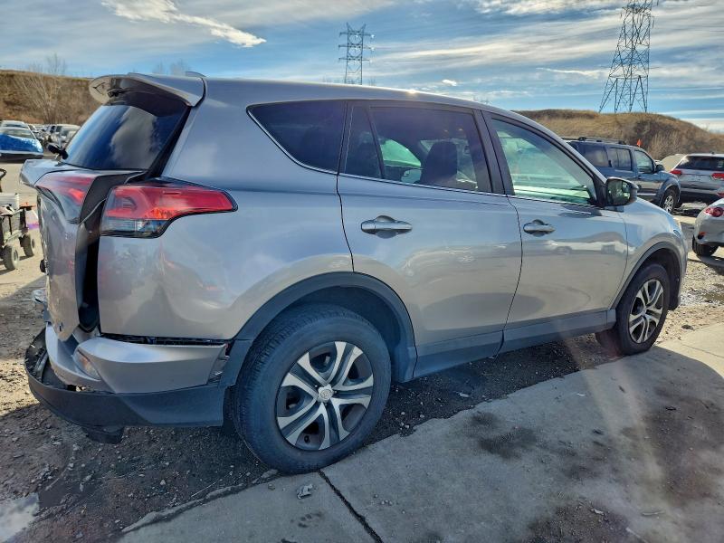 Photo 3 from auction – 2018 TOYOTA RAV4 LE with VIN 2T3BFREV1JW734448