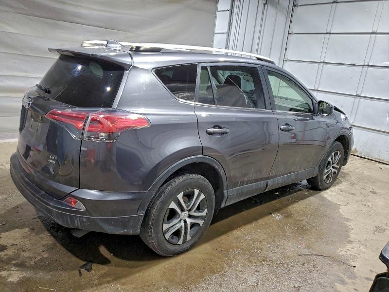 Photo 3 from auction – 2018 TOYOTA RAV4 LE with VIN JTMBFREV8JJ241803