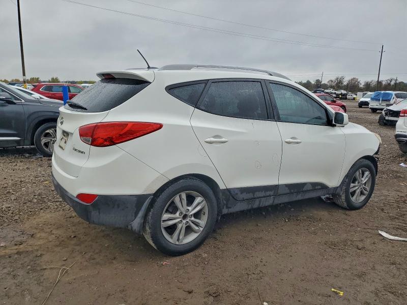 Photo 3 from auction – 2011 HYUNDAI TUCSON GLS with VIN KM8JU3AC5BU125585