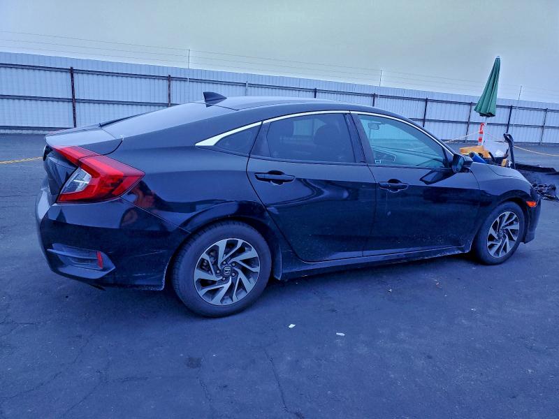 Photo 3 from auction – 2017 HONDA CIVIC EX with VIN 2HGFC2F74HH534287