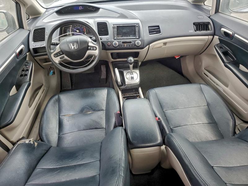 Photo 8 from auction – 2006 HONDA CIVIC HYBR with VIN JHMFA36276S028780