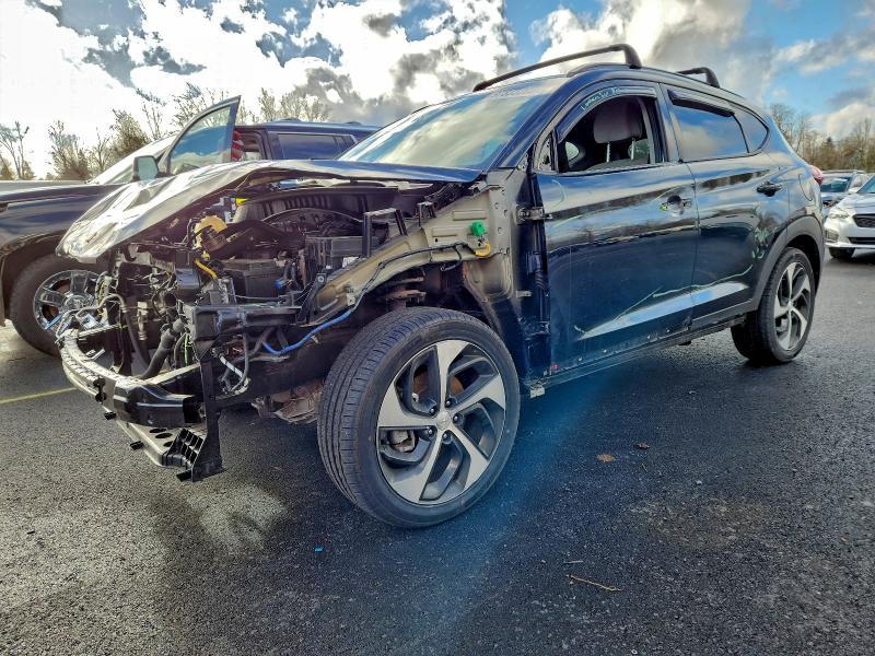 HYUNDAI TUCSON VAL 2018 with VIN KM8J3CA2XJU704841 - Photo from auction