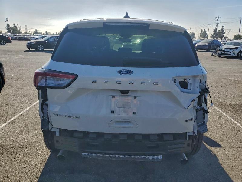 Photo 6 from auction – 2021 FORD ESCAPE with VIN 1FMCU0DZ0MUA06563