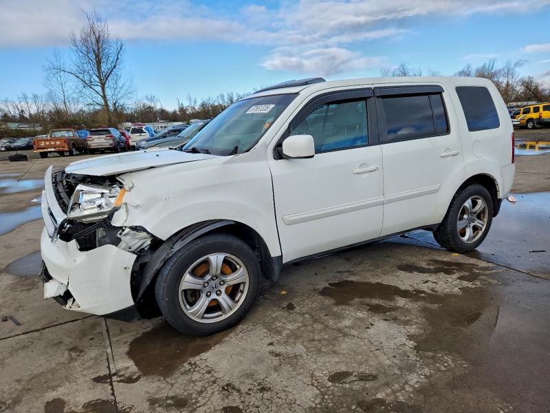HONDA PILOT EXL 2012 with VIN 5FNYF4H52CB039882 - Photo from auction