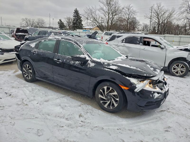 Photo 4 from auction – 2018 HONDA CIVIC EX with VIN 19XFC2F70JE005905