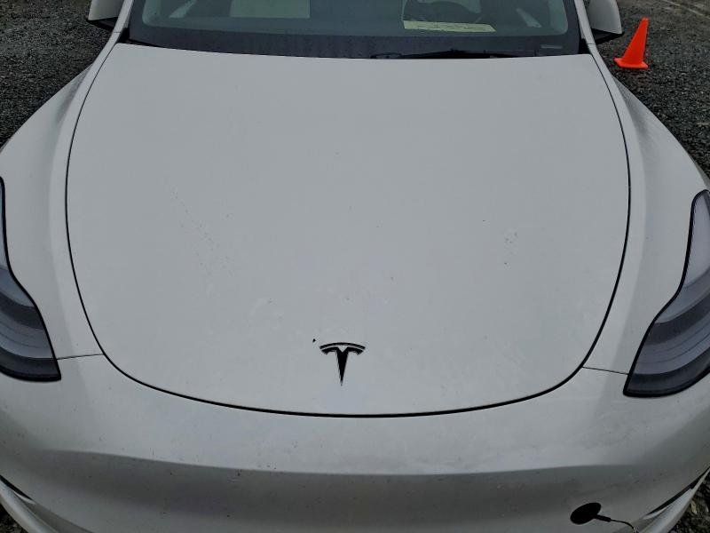 Photo 12 from auction – 2022 TESLA MODEL Y with VIN 7SAYGDEE6NF546551