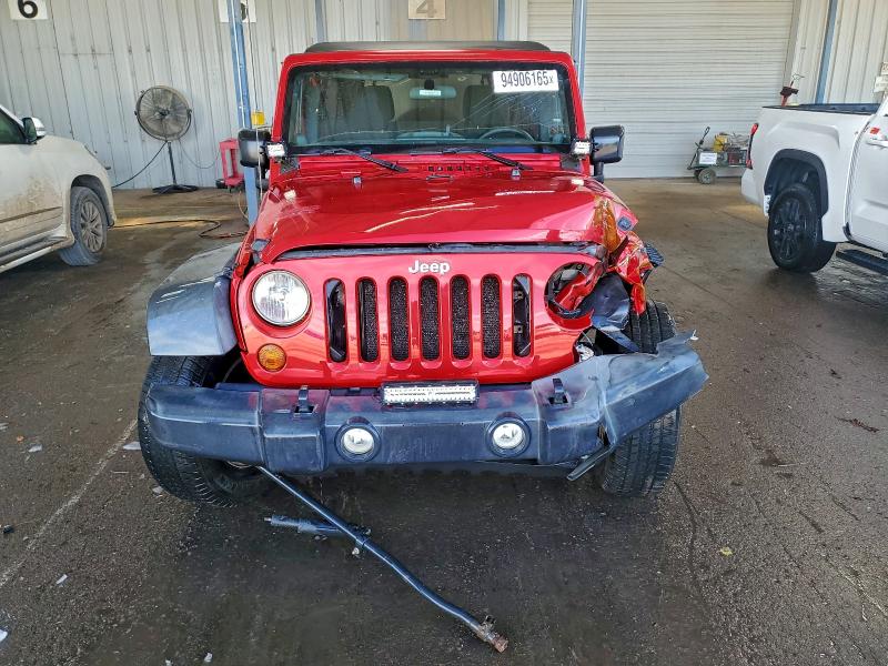 Photo 5 from auction – 2012 JEEP WRANGLER U with VIN 1C4BJWDG3CL142930