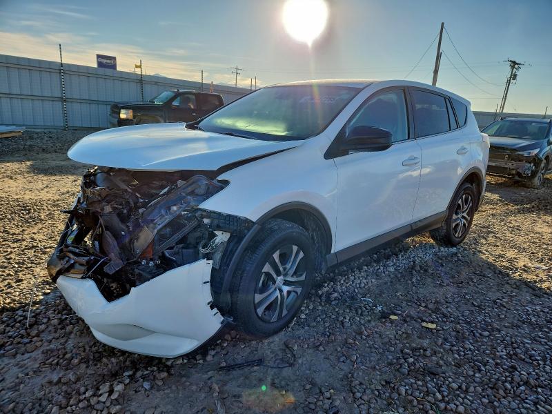 TOYOTA RAV4 LE 2018 with VIN 2T3BFREV6JW717130 - Photo from auction