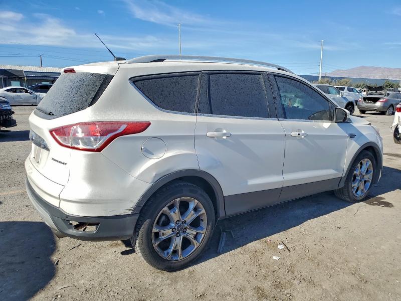 Photo 3 from auction – 2016 FORD ESCAPE with VIN 1FMCU0J98GUA70083